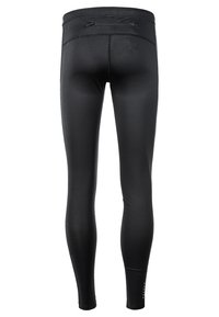 Svarta sportleggings tillverkade av ett mjukt, stretchigt tyg med en åtsittande design. Har en liten ficka på baksidan och minimala detaljer.