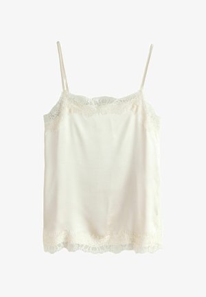 Krémová saténová kamizola s tenkými ramienkami a riasenou čipkovou lemovkou na výstrihu a spodnom okraji.