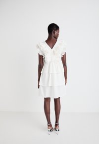 YAS YASRUNA RUFFLE DRESS  - Koktailové šaty/večierkové šaty - star white