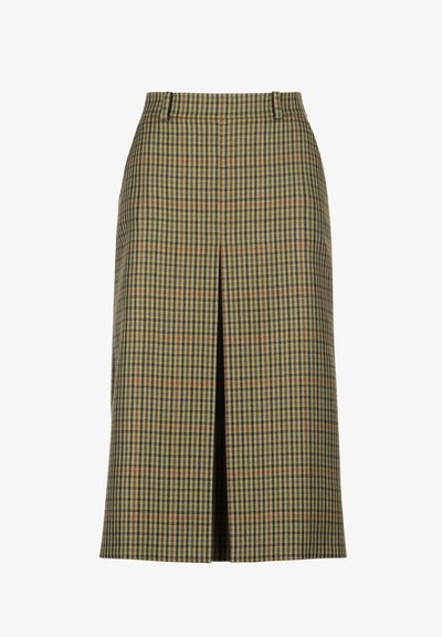 Raibs zīmuļu svārki, austs audums zaļā, brūnā un krēmkrāsas krāsā. Piedāvā priekšējo šķēlumu un pieguļošu jostasvietu. Vidēja garuma dizains.