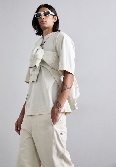 A-COLD-WALL* FORMAT PANT - Housut - beige bone