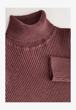Mély bordó színű bordázott garbó pulóver. Puha anyagú, testhezálló kialakítású, finom, függőlegesen futó keretvonalakkal.