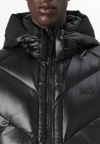 Helly Hansen VILLAGE UNISEX - Daunenjacke - black