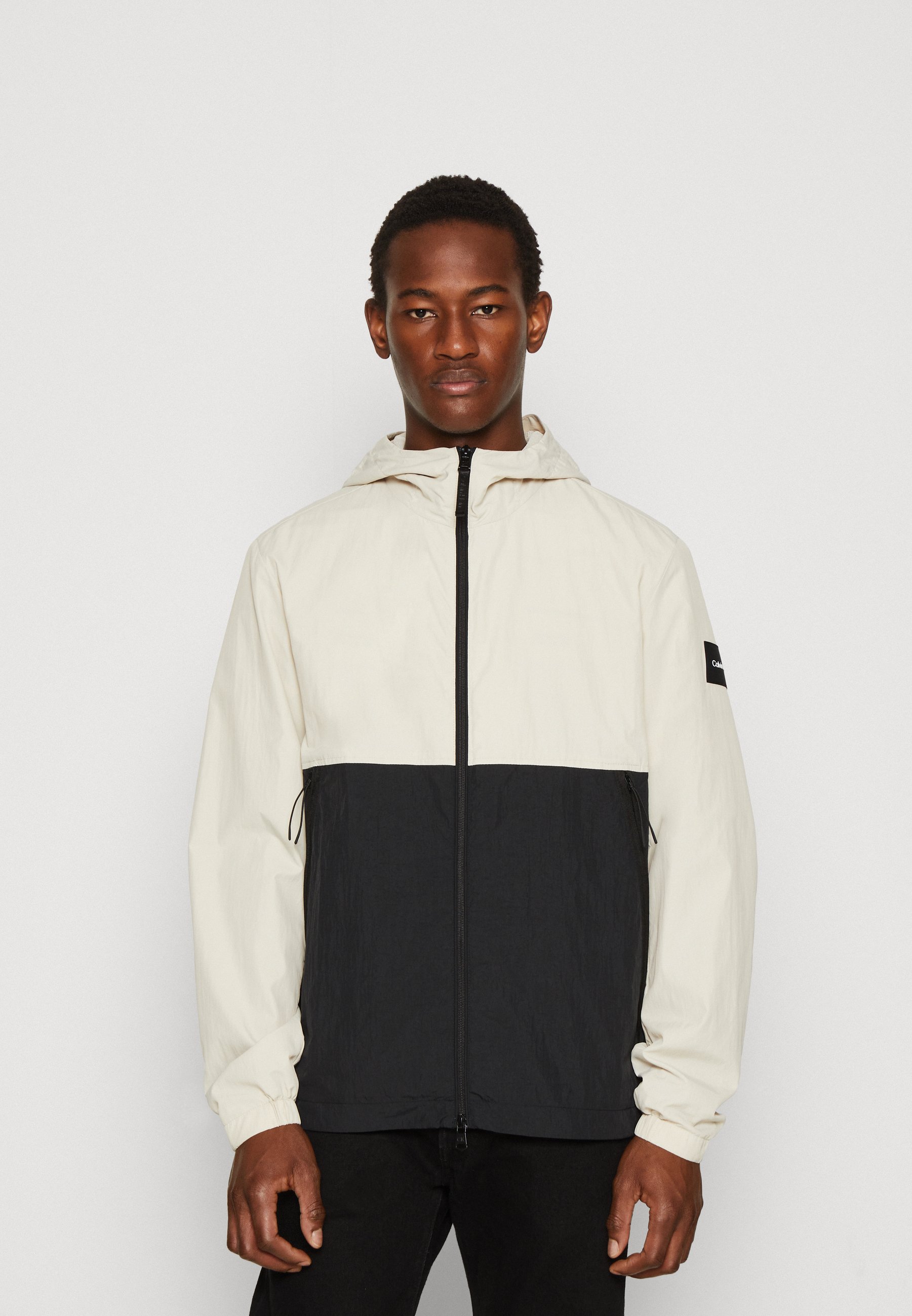 Calvin Klein CRINKLE W HOOD Giacca leggera stony beige/black