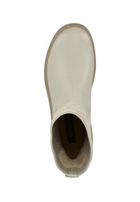 Ljus beige ankelsko med en slät läderovandel, elastisk sidopanel, rund tå och en mjuk foder. Platt gummisula för bra grepp.