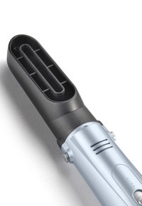 Hair styling tool with a rectangular black nozzle attachment and a silver handle featuring control buttons and vents.