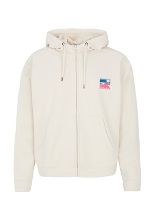 Crème zip-up hoodie met een trekkoordcapuchon en voorzakken. Bevat een kleurrijke logo patch met elementen in blauw, roze en wit.