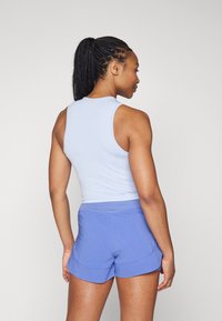Under Armour TRAIN SEAMLESS - Topper - celeste/white