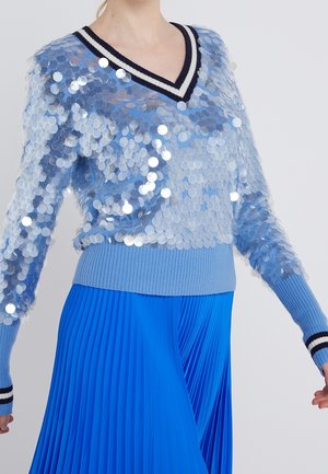 Stickad tröja - light blue