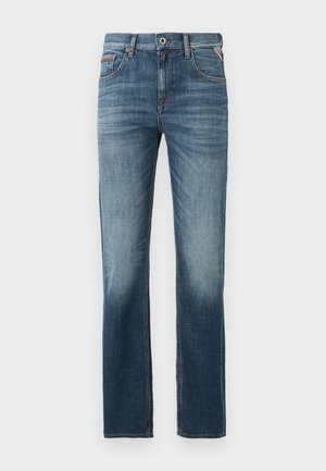 Donkerblauwe denim jeans met een rechte pijp, subtiele vervaging op de dijen en contrasterende stiksels. Klassiek vijf-pocket ontwerp met een rits.
