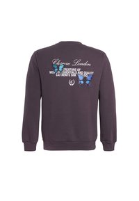Lilla sweatshirt med rund halsudskæring, ribbede manchetter og kant, samt trykte blå sommerfuglegrafikker og tekst "Closure London" på ryggen.