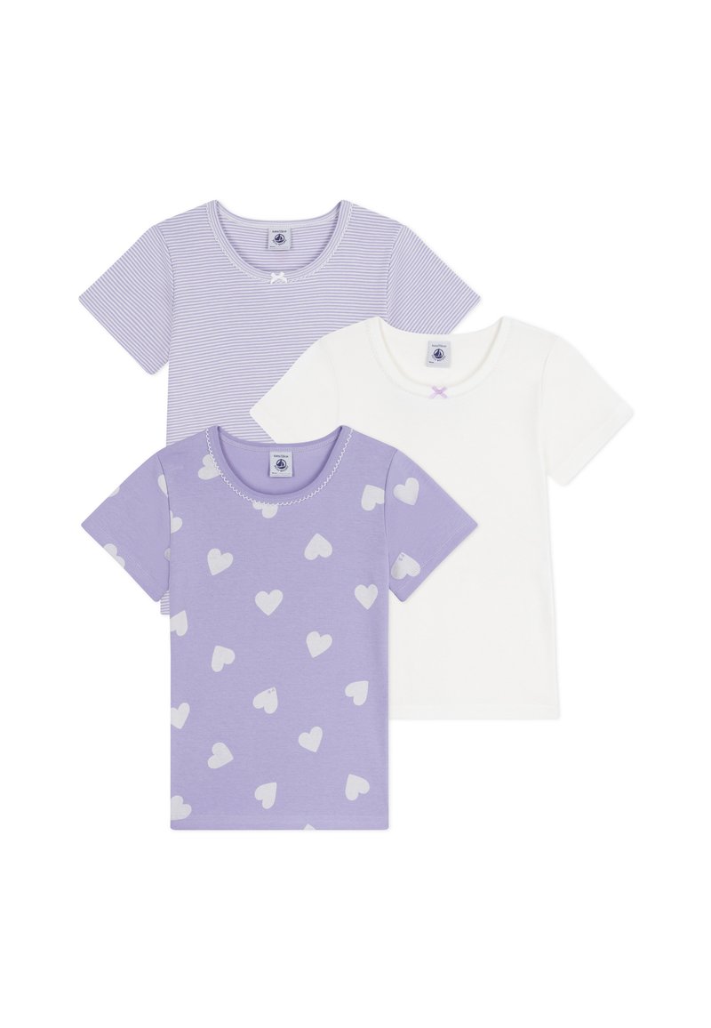 Three short-sleeve shirts: one light purple striped, one white with a small lavender accent, and one lavender with heart patterns.