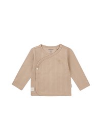 Beige langwerpige wikkelshirt met lange mouwen gemaakt van ribgebreide stof. Heeft een drukknoopsluiting aan de voorkant en een klein logo versiering.