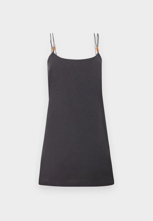 Robe noire sans manches avec fines bretelles doubles ornées de détails en perles orange, présentée sur un fond blanc.