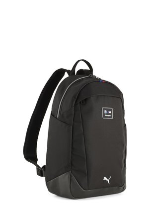 Sac à dos Puma noir avec logo BMW Motorsport, bretelles rembourrées et compartiment principal zippé.