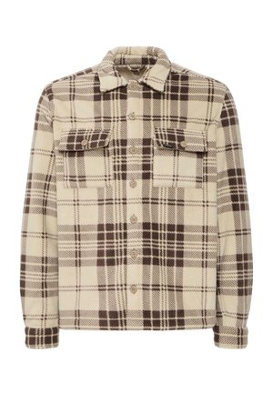 Beige plaid shirt made of soft fabric, featuring dark brown check patterns, two chest pockets, and button closures along the front.