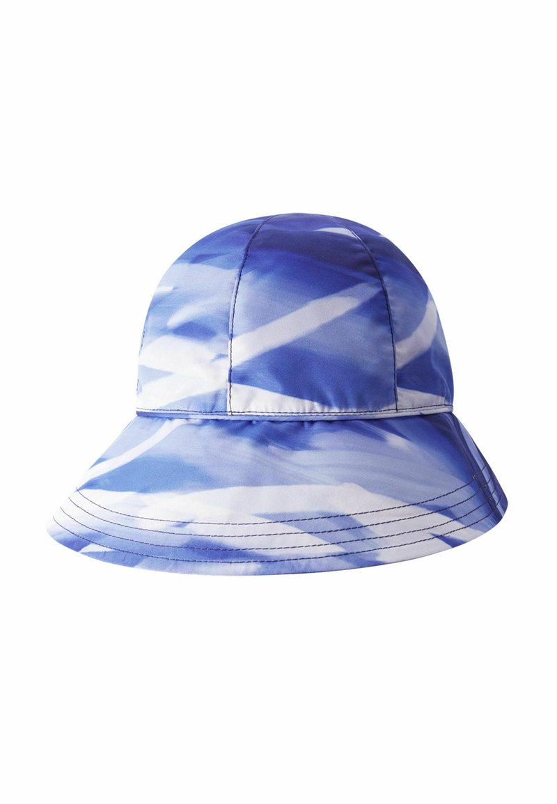 Blue and white tie-dye bucket hat made of fabric, with a wide brim and stitched seams, featuring a rounded crown and soft texture.