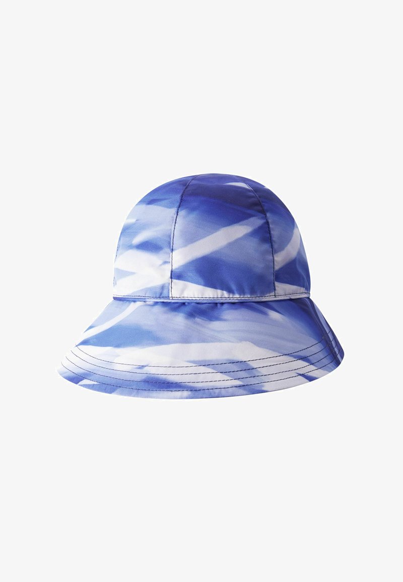 Blue and white tie-dye bucket hat made of fabric, with a wide brim and stitched seams, featuring a rounded crown and soft texture.