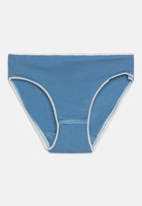 Mėlyna medvilninė bikini kelnaitės su baltu banguotu apvadu aplink liemenėlę ir kojų iškirpimus; glotni tekstūra, lengvas dizainas, vidutinio aukščio fasonas.