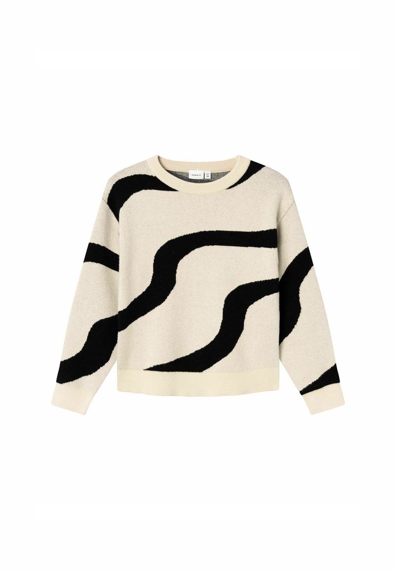 Pull crème avec des rayures noires ondulées abstraites sur le corps et les manches, doté d'un col rond et de poignets et ourlet côtelés.