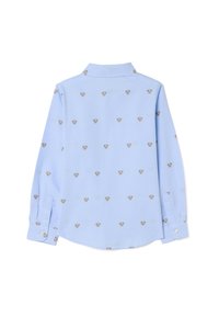 Lichtblauw overhemd met lange mouwen, voorzien van een herhaald patroon van teddybeer gezichten, een klassieke kraag en knoopmanchetten. Stevige stofstructuur.