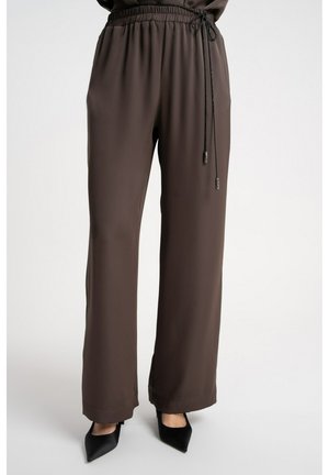 - Spodnie materiałowe