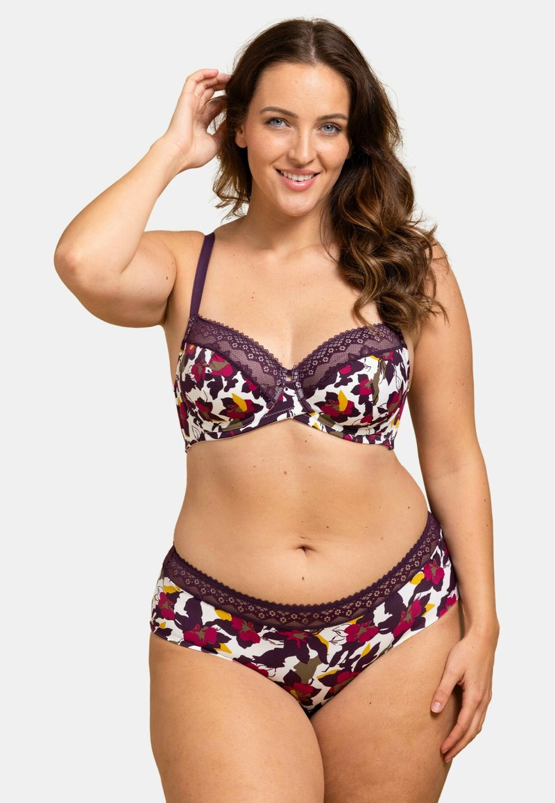Ensemble de soutien-gorge et culotte avec un motif floral dans des tons de violet, rouge et jaune. Comprend des bordures en dentelle et des bretelles réglables. Texture de tissu douce.