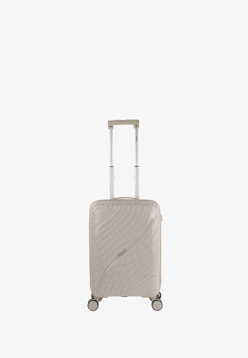 Maleta rígida en beige con un diseño texturizado ondulado, asa retráctil y cuatro ruedas de giro suave para una fácil maniobrabilidad.