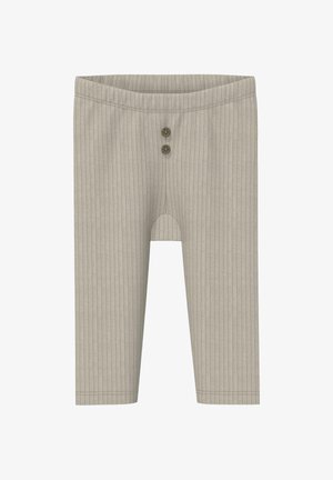 Beżowe prążkowane legginsy niemowlęce z dwoma brązowymi dekoracyjnymi guzikami na elastycznym pasku.