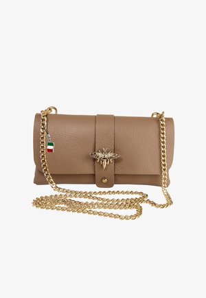 Beige leather handbag with a gold chain strap, featuring a bee-shaped clasp and a small Italian flag tag. Smooth texture with a fold-over design.