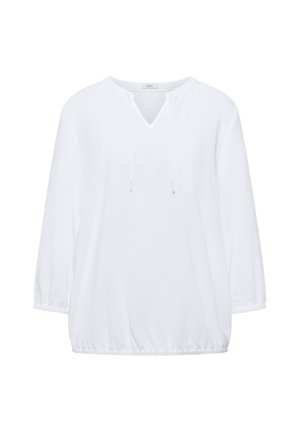 Blouse blanche à manches longues avec col en V et cordon à nouer, poignets et ourlet élastiques, coupe ample, design uni.