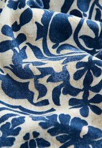 Unselected, blue cream geo print