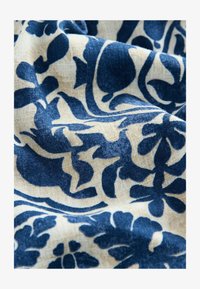 Unselected, blue cream geo print