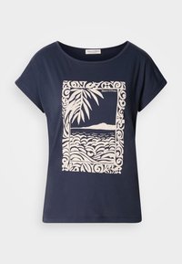 Navy blue cotton t-shirt featuring a cream-colored graphic of waves and palm leaves within a decorative border. Smooth texture, short sleeves.