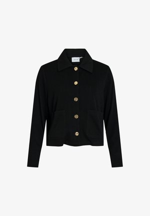 Veste noire cropped avec un col, dotée d'une fermeture à boutons à l'avant et de deux poches avant. Les boutons dorés contrastent avec la texture du tissu.