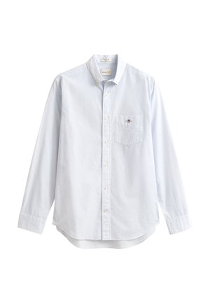 Ljusblå långärmad skjorta med knappar, tillverkad i bomull. Har en bröstficka på vänster sida och en klassisk krage med liten varumärkesdetalj.