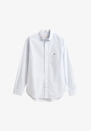 Svetlomodrá košeľa s dlhým rukávom na gombíky, vyrobená z bavlny. Má vrecko na ľavej strane hrude a klasický golier s malým značkovým detailom.