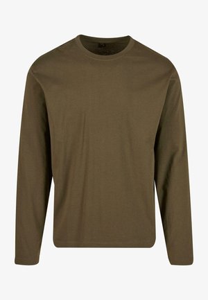 Majica dugih rukava napravljena od maslinasto zelene pamučne tkanine. Ima klasičan okrugli izrez i opušteni kroj. Glatka tekstura bez vidljivih uzoraka.