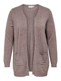 Svijetlosmeđa cardigan u mekom pletenom materijalu. Dizajn bez zatvaranja s dva prednja džepa i rebrastim manžetama. Bez kopčanja.
