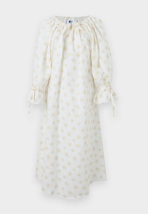 Λευκό μίντι φόρεμα με μακριά μανίκια, πιέτες στον λαιμό, κορδόνια στα μανίκια και κίτρινο σχέδιο με λουλούδια μαργαρίτας.