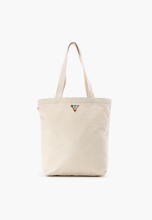 Canvas tote bag in beige with two sturdy handles, featuring a triangular, multicolored design on the front. Smooth texture, spacious interior.