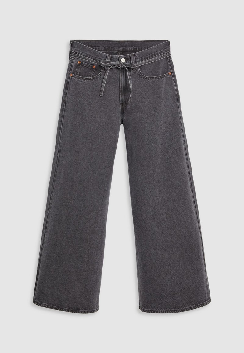 Weit geschnittene Jeans aus verblichenem schwarzem Denim, mit Knopfverschluss, verstellbarem Bund und dezenten orangen Nähten.