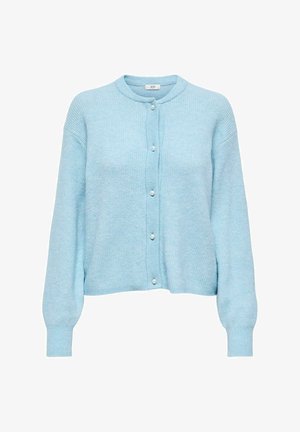 Hele sinine kudumiskardigan ribatud tekstuuriga, ümmargune kaelus ja nööpidega ees. Omab pärlilaadseid nuppe ja laiu varrukaid.