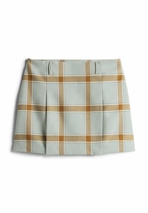 Jupe mini à carreaux bleu clair et beige avec des plis et des passants de ceinture, posée à plat sur un fond blanc.