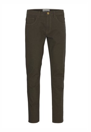 Brūnas kokvilnas bikses ar slaidu piegriezumu, kurām ir piecas kabatas, rāvējslēdzējs un zelta izvīļojums. Gluda tekstūra bez redzamām rakstainēm.