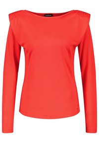 Maglietta rossa a maniche lunghe realizzata in materiale liscio, con scollatura a barca e sottili dettagli sulle spalle. Design semplice e aderente senza motivi.