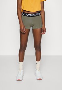 Nike Performance W NP 365  3IN - Leggings - medium olive/black