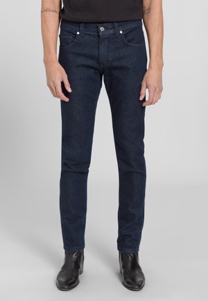 JAYDEN - Slim fit jeans - dark blue raw