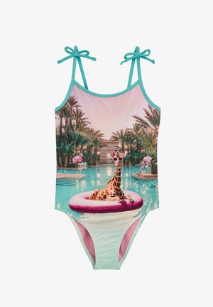 Maillot de bain une pièce avec une girafe sur une bouée rose, des bretelles turquoise, et un décor tropical au bord de la piscine aux couleurs pastel.