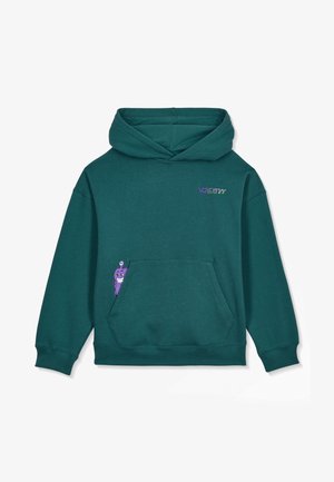 Sweat à capuche vert sarcelle avec poche avant, petit personnage de dessin animé violet visible dans la poche, et logo "Volcom" multicolore sur la poitrine.